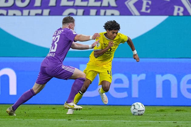 01.09.2026, xydrx, Fußball, DFB Pokal, HEBC Hamburg - Borussia Dortmund, Saison 2026 2027, Volksparkstadion: Christopher Gruenewald (HEBC Hamburg, 33) im Zweikampf gegen Mathis Albert (Borussia Dortmund, 41) DFB regulations prohibit any use of photographs as image sequences and or quasi-video. *** September 1, 2026, xydrx, Soccer, DFB Cup, HEBC Hamburg vs. Borussia Dortmund, 2026–2027 season, Volksparkstadion, Christopher Gruenewald (HEBC Hamburg), No. 33 in a tackle against Mathis Albert (Borussia Dortmund), No. 41. DFB regulations prohibit any use of photographs as image sequences and or quasi-video. Copyright: HMBxMedia YannisxDreimann