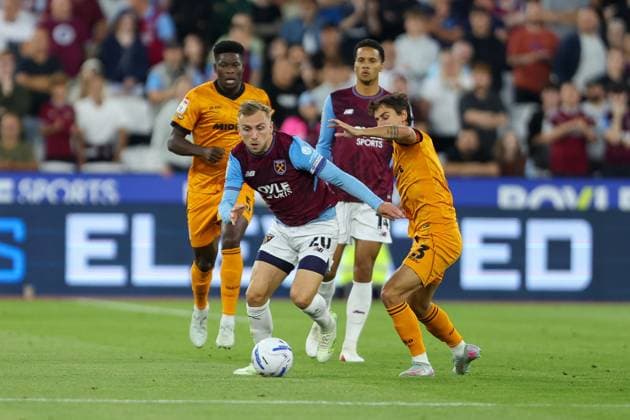 Jarrod Bowen of West Ham United is challenged by Hugo Bueno of Wolverhampton Wanderers West Ham United v Wolverhampton Wanderers, EFL Championship, Football, London Stadium, London, UK, 01 09 2026, England - 01 Sep 2026London London Stadium England United Kingdom EDITORIAL USE ONLY No use with unauthorised audio, video, data, fixture lists, club league logos or live services. Online in-match use limited to 120 images, no video emulation. No use in betting, games or single club league player publications.  Copyright: xHanc WiredxPhotos Shutterstockx 17129749a