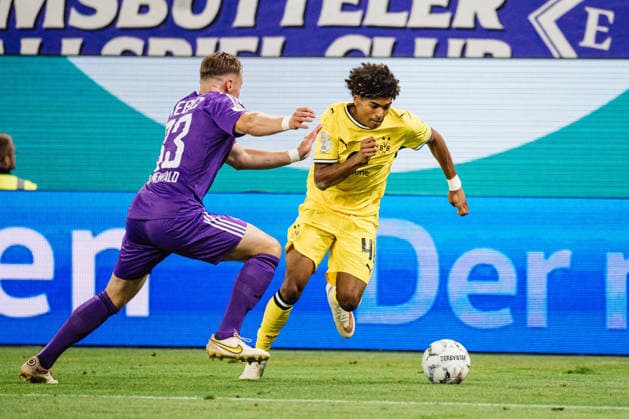 DFB-Pokal: HEBC - Borussia Dortmund, 01.09.2026 Christopher Grünewald (HEBC Hamburg, 33) gegen Mathis Albert (Borussia Dortmund, 41); Fußball, DFB-Pokal, 1. Runde: HEBC vs. Borussia Dortmund am 01.09.2026 im Volksparkstadion, Hamburg DFB REGULATIONS PROHIBIT ANY USE OF PHOTOGRAPHS AS IMAGE SEQUENCES AND OR QUASI-VIDEO. *** DFB Cup: HEBC vs. Borussia Dortmund, September 1, 2026; Christopher Grünewald (HEBC Hamburg, 33) vs. Mathis Albert (Borussia Dortmund, 41); Soccer, DFB Cup, Round 1: HEBC vs. Borussia Dortmund on September 1, 2026, at the Volksparkstadion, Hamburg. DFB regulations prohibit any use of photographs as image sequences and or quasi-video. Copyright: xBEAUTIFULxSPORTS Tonhäuserx