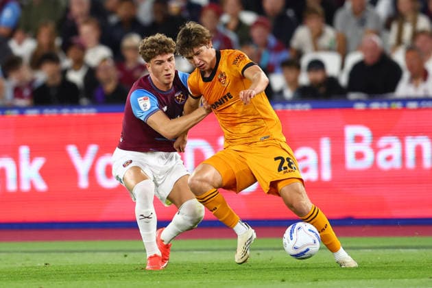 London, England, 1st September 2026. Arne Engels of West Ham United and Fer Lopez of Wolverhampton Wanderers challenge for the ball during the West Ham United vs Wolverhampton Wanderers Sky Bet Championship match at the London Stadium, London. Picture credit should read: Paul Terry Sportimage EDITORIAL USE ONLY. No use with unauthorised audio, video, data, fixture lists, club league logos or live services. Online in-match use limited to 120 images, no video emulation. No use in betting, games or single club league player publications. SPI_011_PT_West_Ham_Wolves SPI-4952-0011
