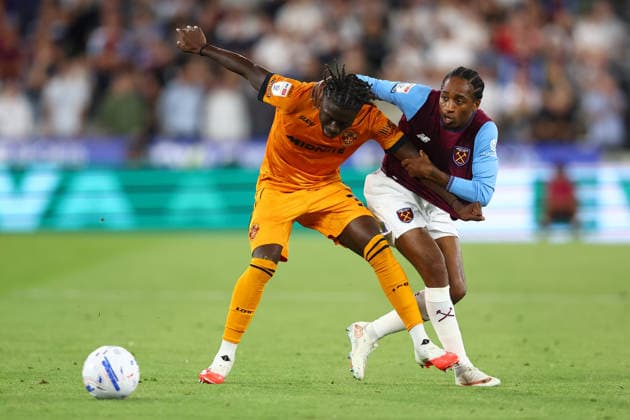 London, England, 1st September 2026. Mateus Mane of Wolverhampton Wanderers and Kyle Walker-Peters of West Ham United challenge for the ball during the West Ham United vs Wolverhampton Wanderers Sky Bet Championship match at the London Stadium, London. Picture credit should read: Paul Terry Sportimage EDITORIAL USE ONLY. No use with unauthorised audio, video, data, fixture lists, club league logos or live services. Online in-match use limited to 120 images, no video emulation. No use in betting, games or single club league player publications. SPI_025_PT_West_Ham_Wolves SPI-4952-0025