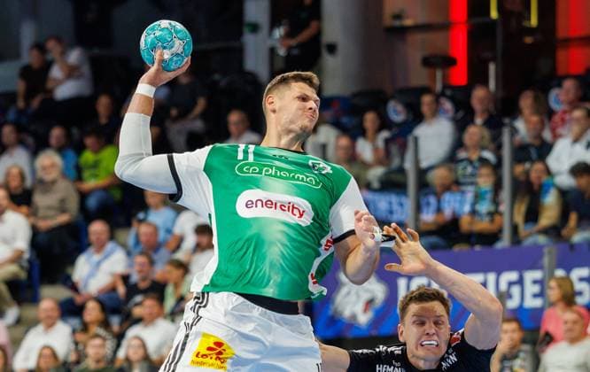 02.09.2026 - Handball - 1. Bundesliga OPEL HBL - Saison 2026 2027 - 02. Spieltag: HC Erlangen Metropolregion Nürnberg HCE - TSV Hannover-Burgdorf ( Die Recken ) - DaMa - xdaxmax - Sebastian Heymann (11, TSV Hannover-Burgdorf ) Christoph Steinert ( 44, HC Erlangen HCE )