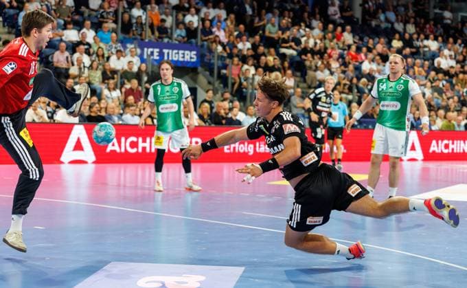 02.09.2026 - Handball - 1. Bundesliga OPEL HBL - Saison 2026 2027 - 02. Spieltag: HC Erlangen Metropolregion Nürnberg HCE - TSV Hannover-Burgdorf ( Die Recken ) - DaMa - xdaxmax - Simon Gade (16, TSV Hannover-Burgdorf ) Florian Scheerer (10, HC Erlangen HCE )