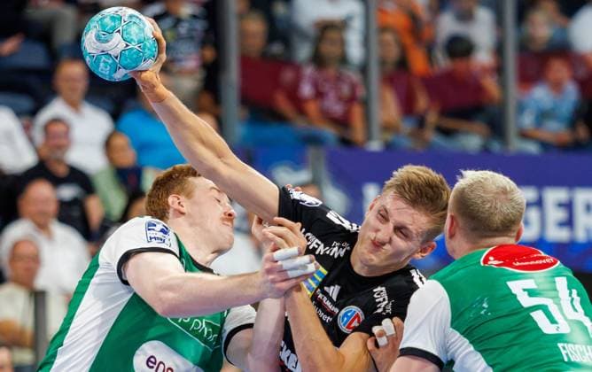 02.09.2026 - Handball - 1. Bundesliga OPEL HBL - Saison 2026 2027 - 02. Spieltag: HC Erlangen Metropolregion Nürnberg HCE - TSV Hannover-Burgdorf ( Die Recken ) - DaMa - xdaxmax - Lukas Stutzke (39, TSV Hannover-Burgdorf ) Sander Andreassen Overjordet ( 8, HC Erlangen HCE ) Justus Fischer (54, TSV Hannover-Burgdorf )