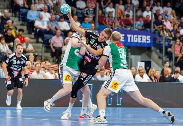 02.09.2026 - Handball - 1. Bundesliga OPEL HBL - Saison 2026 2027 - 02. Spieltag: HC Erlangen Metropolregion Nürnberg HCE - TSV Hannover-Burgdorf ( Die Recken ) - DaMa - xdaxmax - Lukas Stutzke (39, TSV Hannover-Burgdorf ) Sander Andreassen Overjordet ( 8, HC Erlangen HCE ) Justus Fischer (54, TSV Hannover-Burgdorf )