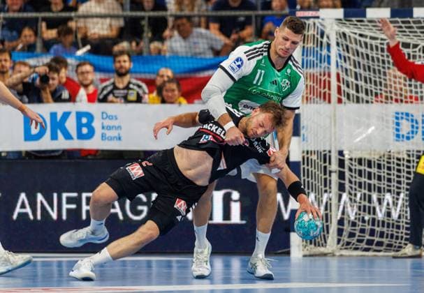 02.09.2026 - Handball - 1. Bundesliga OPEL HBL - Saison 2026 2027 - 02. Spieltag: HC Erlangen Metropolregion Nürnberg HCE - TSV Hannover-Burgdorf ( Die Recken ) - DaMa - xdaxmax - Frieder Bandlow (2, HC Erlangen HCE ) Sebastian Heymann (11, TSV Hannover-Burgdorf )