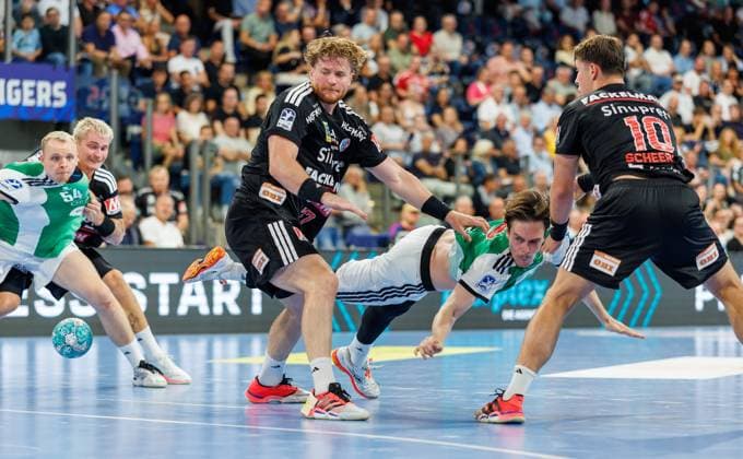 02.09.2026 - Handball - 1. Bundesliga OPEL HBL - Saison 2026 2027 - 02. Spieltag: HC Erlangen Metropolregion Nürnberg HCE - TSV Hannover-Burgdorf ( Die Recken ) - DaMa - xdaxmax - Maciej Gebala (77, HC Erlangen HCE ) Leif Tissier (7, TSV Hannover-Burgdorf ) Florian Scheerer (10, HC Erlangen HCE )