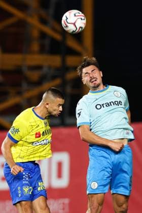 STVV s Visar Musliu and Union s Mateo Biondic fight for the ball during a soccer match between STVV and Union Saint-Gilloise, Wednesday 2 September 2026 in Sint-Truiden, on day 3 of the 2026-2027 Jupiler Pro League first division of the Belgian championship. BRUNOxFAHY  x185058666x
