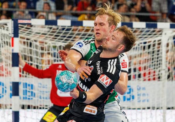 02.09.2026 - Handball - 1. Bundesliga OPEL HBL - Saison 2026 2027 - 02. Spieltag: HC Erlangen Metropolregion Nürnberg HCE - TSV Hannover-Burgdorf ( Die Recken ) - DaMa - xdaxmax - Marian Michalczik (22, TSV Hannover-Burgdorf ) Frieder Bandlow (2, HC Erlangen HCE )