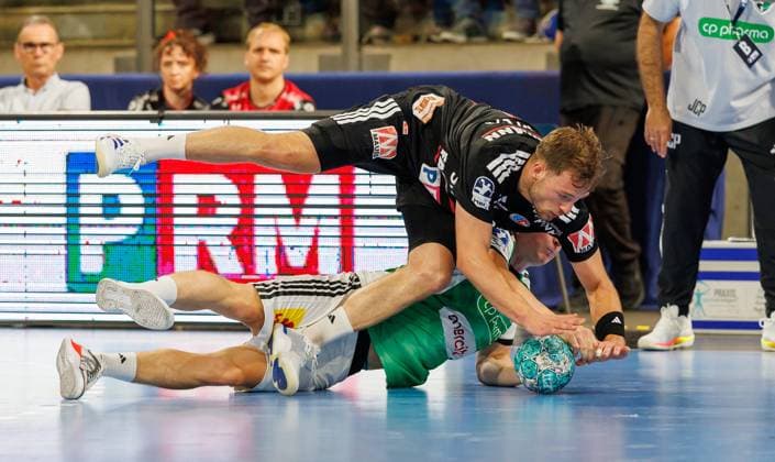 02.09.2026 - Handball - 1. Bundesliga OPEL HBL - Saison 2026 2027 - 02. Spieltag: HC Erlangen Metropolregion Nürnberg HCE - TSV Hannover-Burgdorf ( Die Recken ) - DaMa - xdaxmax - Frieder Bandlow (2, HC Erlangen HCE ) August Baskar Pedersen (17, TSV Hannover-Burgdorf )