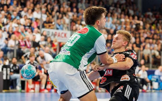 02.09.2026 - Handball - 1. Bundesliga OPEL HBL - Saison 2026 2027 - 02. Spieltag: HC Erlangen Metropolregion Nürnberg HCE - TSV Hannover-Burgdorf ( Die Recken ) - DaMa - xdaxmax - Renars Uscins (10, TSV Hannover-Burgdorf ) Sander Andreassen Overjordet ( 8, HC Erlangen HCE )