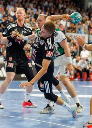 02.09.2026 - Handball - 1. Bundesliga OPEL HBL - Saison 2026 2027 - 02. Spieltag: HC Erlangen Metropolregion Nürnberg HCE - TSV Hannover-Burgdorf ( Die Recken ) - DaMa - xdaxmax - Justus Fischer (54, TSV Hannover-Burgdorf ) Sander Andreassen Overjordet ( 8, HC Erlangen HCE )
