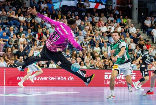 02.09.2026 - Handball - 1. Bundesliga OPEL HBL - Saison 2026 2027 - 02. Spieltag: HC Erlangen Metropolregion Nürnberg HCE - TSV Hannover-Burgdorf ( Die Recken ) - DaMa - xdaxmax - Rubens Pierre (93, HC Erlangen HCE ) Renars Uscins (10, TSV Hannover-Burgdorf )