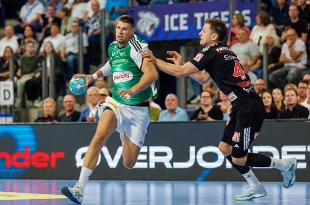 02.09.2026 - Handball - 1. Bundesliga OPEL HBL - Saison 2026 2027 - 02. Spieltag: HC Erlangen Metropolregion Nürnberg HCE - TSV Hannover-Burgdorf ( Die Recken ) - DaMa - xdaxmax - Sebastian Heymann (11, TSV Hannover-Burgdorf ) Christoph Steinert ( 44, HC Erlangen HCE )