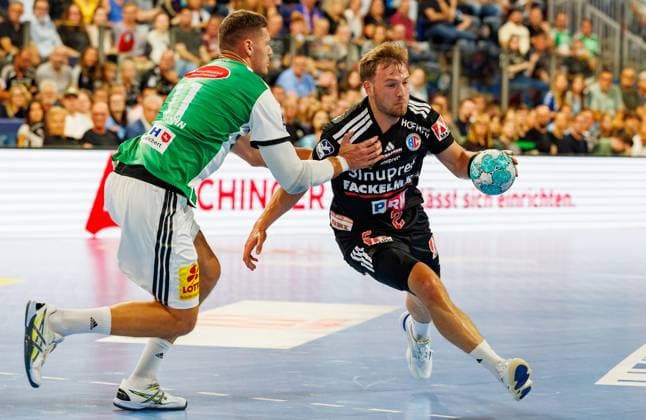 02.09.2026 - Handball - 1. Bundesliga OPEL HBL - Saison 2026 2027 - 02. Spieltag: HC Erlangen Metropolregion Nürnberg HCE - TSV Hannover-Burgdorf ( Die Recken ) - DaMa - xdaxmax - Sebastian Heymann (11, TSV Hannover-Burgdorf ) Frieder Bandlow (2, HC Erlangen HCE )