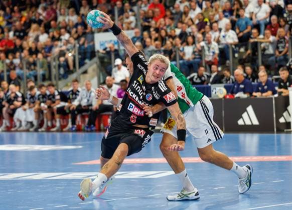 02.09.2026 - Handball - 1. Bundesliga OPEL HBL - Saison 2026 2027 - 02. Spieltag: HC Erlangen Metropolregion Nürnberg HCE - TSV Hannover-Burgdorf ( Die Recken ) - DaMa - xdaxmax - Marek Nissen (6, HC Erlangen HCE ) Sebastian Heymann (11, TSV Hannover-Burgdorf )