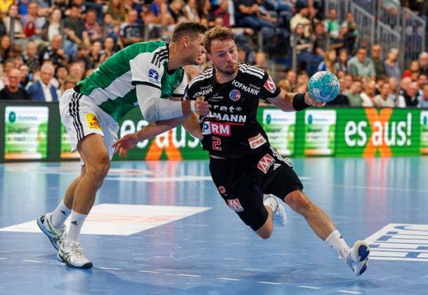 02.09.2026 - Handball - 1. Bundesliga OPEL HBL - Saison 2026 2027 - 02. Spieltag: HC Erlangen Metropolregion Nürnberg HCE - TSV Hannover-Burgdorf ( Die Recken ) - DaMa - xdaxmax - Sebastian Heymann (11, TSV Hannover-Burgdorf ) Frieder Bandlow (2, HC Erlangen HCE )