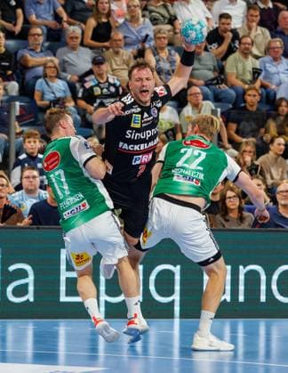 02.09.2026 - Handball - 1. Bundesliga OPEL HBL - Saison 2026 2027 - 02. Spieltag: HC Erlangen Metropolregion Nürnberg HCE - TSV Hannover-Burgdorf ( Die Recken ) - DaMa - xdaxmax - August Baskar Pedersen (17, TSV Hannover-Burgdorf ) Frieder Bandlow (2, HC Erlangen HCE ) Marian Michalczik (22, TSV Hannover-Burgdorf )