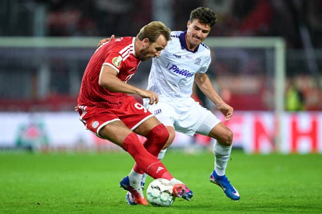 DFB Pokal - 26 27 - VfL Osnabrück - FC Bayern München am 02.09.2026 an der Bremer Brücke in Osnabrück Harry Kane (Bayern Muenchen) im Zweikampf gegen Münst Leonhard (Osnabrueck)