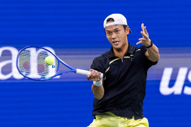 Rei Sakamoto of Japan returns a ball to Frances Tiafoe in the first set of their second round match in Louis Armstrong Stadium at the 2026 US Open Tennis Championships at the USTA Billie Jean King National Tennis Center in New York City on Wednesday, September 2, 2026.  NYP20260902304 COREYxSIPKIN
