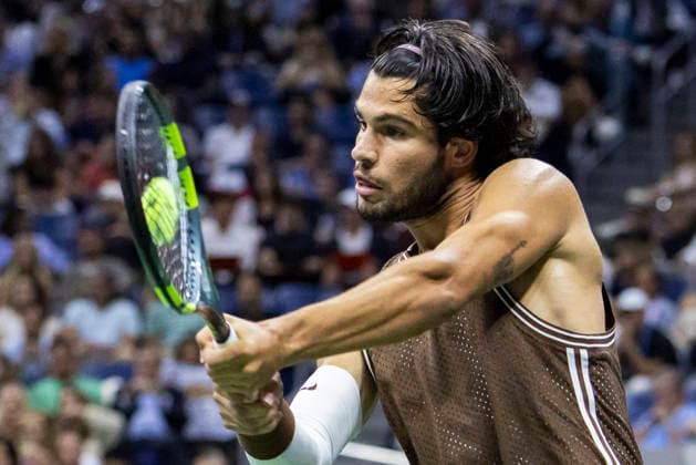 Carlos Alcaraz of Spain returns a ball to Jaime Faria of Portugal in the first set of their second round match in Arthur Ashe Stadium at the 2026 US Open Tennis Championships at the USTA Billie Jean King National Tennis Center in New York City on Wednesday, September 2, 2026.  NYP20260902321 COREYxSIPKIN
