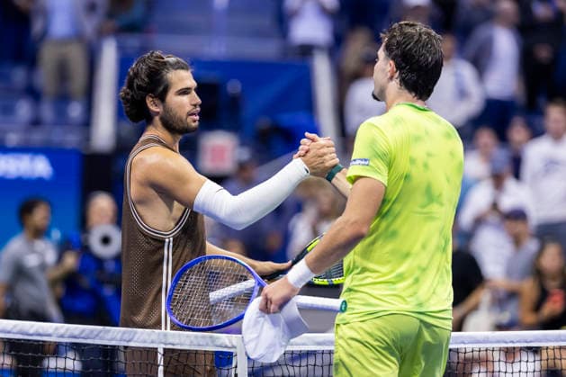 Jaime Faria of Portugal, right, congratulates Carlos Alcaraz of Spain on his win in 4 sets after their second round match in Arthur Ashe Stadium at the 2026 US Open Tennis Championships at the USTA Billie Jean King National Tennis Center in New York City on Wednesday, September 2, 2026.  NYP20260902335 COREYxSIPKIN