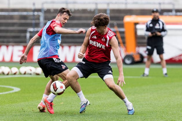 COLOGNE, GERMANY - SEPTEMBER 03: Paul Okon-Engstler (1. FC Koeln, 23) and Mikey Moore (1. FC Koeln, 47) battle for the ball during a training session of season 2026 27 at Geissbockheim on September 03, 2026 in Cologne, Germany. North Rhine Westphalia Germany Copyright: xSteffiexWunderlx
