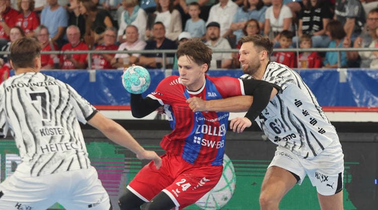 Bietigheim , Handball Opel-HBL , SG BBM Bietigheim vs. THW Kiel , mitte: Maxim Orlov ( BBM )