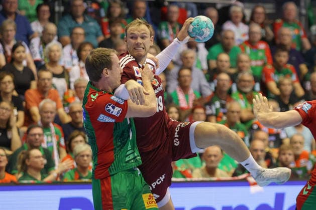 03.09.2026, xtgx, Handball Opel HBL, SC Magdeburg - Füchse Berlin emspor, v.l. Felix Claar (Magdeburg, 7) Mathias Gidsel (Berlin, 19) Zweikampf, Duell, Kampf, tackle Magdeburg