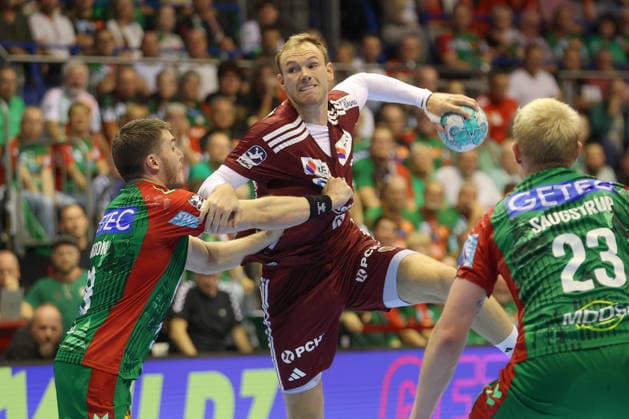 03.09.2026, xtgx, Handball Opel HBL, SC Magdeburg - Füchse Berlin emspor, v.l. Elvar Orn Jonsson (Magdeburg, 19) Mathias Gidsel (Berlin, 19) Zweikampf, Duell, Kampf, tackle Magdeburg