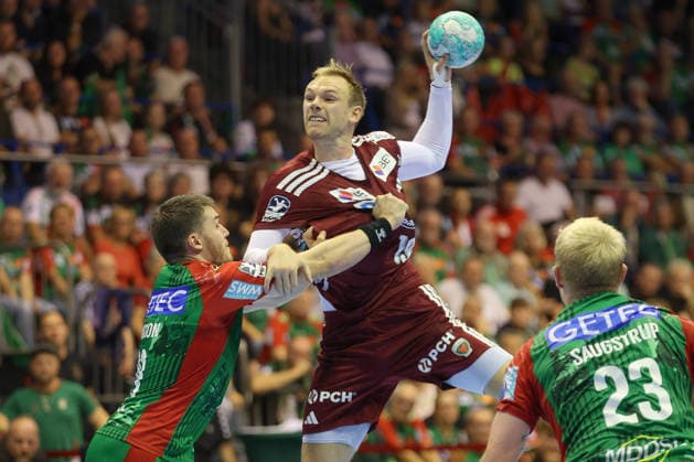 03.09.2026, xtgx, Handball Opel HBL, SC Magdeburg - Füchse Berlin emspor, v.l. Elvar Orn Jonsson (Magdeburg, 19) Mathias Gidsel (Berlin, 19) Zweikampf, Duell, Kampf, tackle Magdeburg