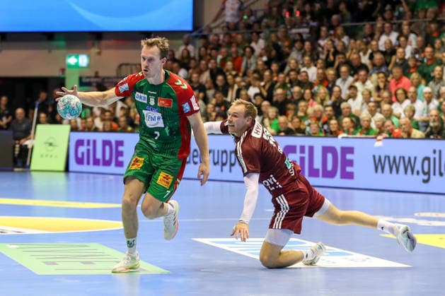 03.09.2026, xgox, Handball - Opel HBL SC Magdeburg - Füchse Berlin emspor, v.l. Felix Claar (Magdeburg, 7), Mathias Gidsel (Berlin, 19) Zweikampf, Duell, Kampf, tackle Magdeburg