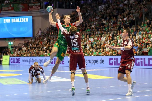 03.09.2026, xgox, Handball - Opel HBL SC Magdeburg - Füchse Berlin emspor, v.l. Felix Claar (Magdeburg, 7), Tobias Grondahl (Berlin, 15) Zweikampf, Duell, Kampf, tackle Magdeburg