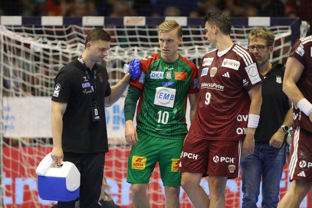 03.09.2026, xtgx, Handball Opel HBL, SC Magdeburg - Füchse Berlin emspor, v.l. Gisli Thorgeir Kristjansson (Magdeburg, 10) verletzt, Verletzung. Rechts Frederik Simak (Berlin, 9) Magdeburg
