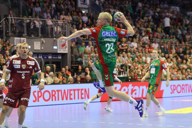 03.09.2026, xtgx, Handball Opel HBL, SC Magdeburg - Füchse Berlin emspor, v.l. Magnus Saugstrup (Magdeburg, 23) wirft Tor, Torschuetze, erzielt Tor, Treffer, scores the goal Magdeburg
