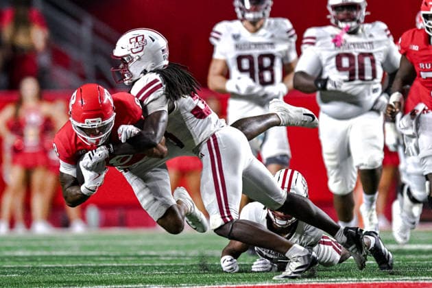 September 3, 2026, Piscataway, Nj, USA: 09 03 26 Rutgers Scarlet Knights wide receiver KJ Duff (8) is tackled after a catch by Massachusetts Minutemen safety Zeraun Daniel (38) during the 2nd half of the football game between the Massachusetts Minutemen and Rutgers Scarlet Knights at SHI Stadium, Thursday Sept. 3, 2026. Massachusetts Minutemen V Rutgers Scarlet Knights  - ZUMAc268 20260903_zsp_c268_025 Copyright: xJamesxPatrickxCooperx
