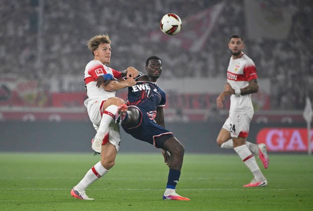 Zweikampf, Aktion Ragnar Ache 1. FC Koeln KOE (09) gegen Finn Jeltsch VfB Stuttgart (29) Jeff Chabot VfB Stuttgart (24) VfB Stuttgart vs 1. FC Koeln 04.09.2026 DFL REGULATIONS PROHIBIT ANY USE OF PHOTOGRAPHS AS IMAGE SEQUENCES AND OR QUASI-VIDEO VfB Stuttgart vs 1. FC Koeln *** Tackle, Action: Ragnar Ache (1 FC Köln, KOE 09) vs. Finn Jeltsch (VfB Stuttgart, 29) and Jeff Chabot (VfB Stuttgart, 24) VfB Stuttgart vs. 1 FC Köln, September 4, 2026. DFL regulations prohibit any use of photographsHS AS IMAGE SEQUENCES AND OR QUASI-VIDEO VfB Stuttgart vs. 1 FC Cologne