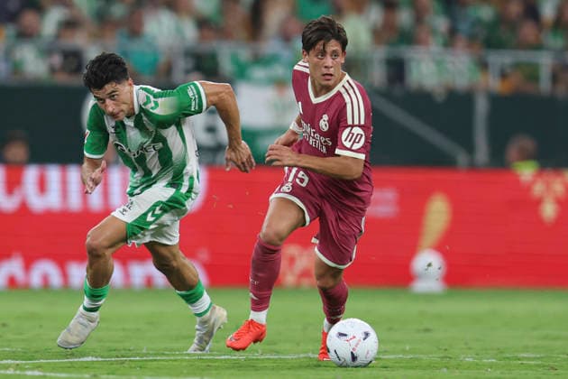 ESP: Real Betis - Real Madrid. La Liga EA Sports. Matchday 4. Arda Guler of Real Madrid and Marc Roca of Real Betis during the La Liga EA Sports match between Real Betis and Real Madrid played at La Cartuja Stadium on Sep 4, 2026 in Sevilla, Spain. kpng Copyright: xAntonioxPozox xPRESSINPHOTOx AP_2627_BET_RMA_044