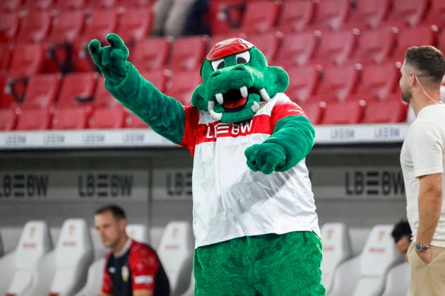 Fritzle, Maskottchen, Krokodil , Deutschland, Fussball, 1. Bundesliga, 2.Spieltag, 2026 2027, VfB Stuttgart vs. 1.FC Köln, 04.09.2026, Stuttgart MHP Arena Deutschland *** Fritzle, mascot, crocodile, Germany, soccer, Bundesliga 1, Matchday 2, 2026–2027, VfB Stuttgart vs. 1. FC Köln, September 4, 2026, Stuttgart MHP Arena, Germany Copyright: xGrantxHubbsx