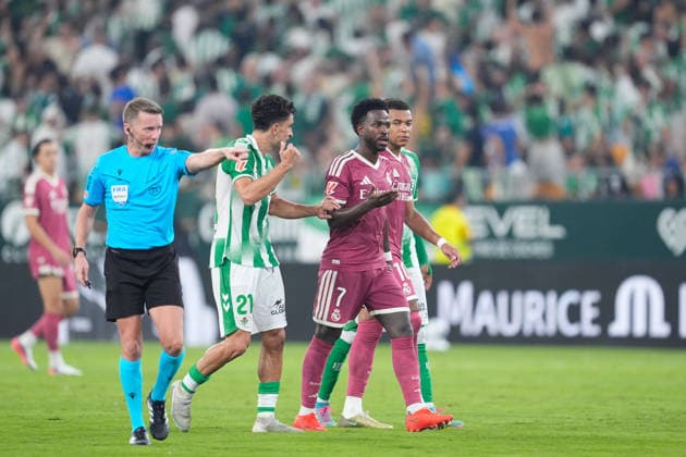 September 4, 2026, Sevilla, Sevilla, Spain: Vinicius Junior of Real Madrid CF and Marc Roca of Real Betis Balompie protest during the Spanish league, LaLiga EA Sports, football match played between Real Betis and Real Madrid at La Cartuja stadium on September 4, 2026, in Sevilla, Spain. Sevilla Spain - ZUMAa181 20260904_zaa_a181_193 Copyright: xJoaquinxCorcherox