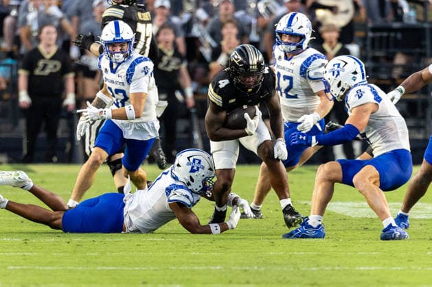 Sep 04, 2026; West Lafayette, Indiana, USA; Purdue running back Jerrick Gibson (4) runs with the ball during NCAA, College League, USA football game action between the Indiana State Sycamores and the Purdue Boilermakers at Ross-Ade Stadium in West Lafayette, Indiana. Mandatory Credit: -Cal Media NCAA Football 2026: Indiana State Vs Purdue SEP 04  - ZUMAc04_ 20260904_zma_c04_017 Copyright: xJohnxMersitsx