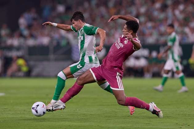 LaLiga EA SPORTS 2026 2027 - Real Betis Balompie and Real Madrid CF in Seville, Spain - 04 Sep 2026 Fran Garcia (Real Betis Balompie) and Jude Bellingham (Real Madrid CF) are seen in action during the LaLiga EA SPORTS 2026 2027 match between Real Betis Balompie and Real Madrid CF Final score: Real Betis Balompie 1-0 Real Madrid CF Seville Spain Copyright: xFedericoxTitonex xSOPAxImagesx Federico-Titone-1446828