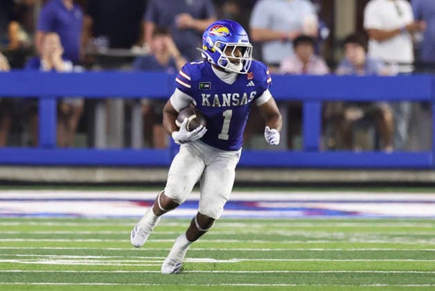 LAWRENCE, KS - SEPTEMBER 04: Dylan Edwards 1 of the Kansas Jayhawks runs with the ball in the second quarter of a college football game between the Long Island Sharks and Kansas Jayhawks on Sep 4, 2026 at David Booth Memorial Stadium in Lawrence, KS. (Photo by Scott Winters Icon Sportswire) COLLEGE FOOTBALL: SEP 04 LIU at Kansas EDITORIAL USE ONLY Icon2609040380