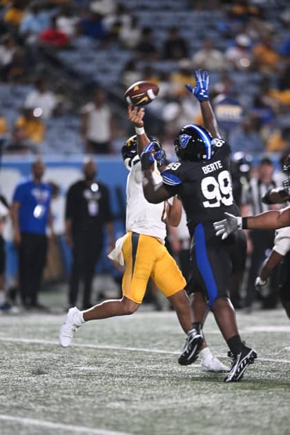 ATLANTA, GA - September 04: North Carolina A&T Aggies QB Kevin White Jr. winds up for a deep throw while being defended by Georgia State Panthers DT Mandjou Berte (99) during game between the North Carolina A&T Aggies and the Georgia State Panthers on September 4, 2026 at Center Parc Credit Union Stadium in Atlanta, GA. (Photo by John Rivera Icon Sportswire) COLLEGE FOOTBALL: SEP 04 NC A&T at Georgia State EDITORIAL USE ONLY Icon426260904017