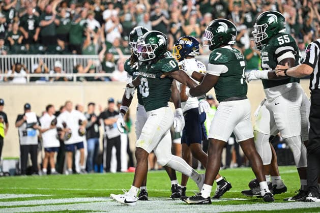 EAST LANSING, MI - SEPTEMBER 04: Michigan State Spartans running back Cam Edwards (0) celebrates the opening touchdown of the season during a college football game between the Michigan State Spartans and Toledo Rockets on September 4, 2026 at Spartan Stadium in East Lansing, MI. (Photo by Adam Ruff Icon Sportswire) COLLEGE FOOTBALL: SEP 04 Toledo at Michigan State EDITORIAL USE ONLY Icon260908004