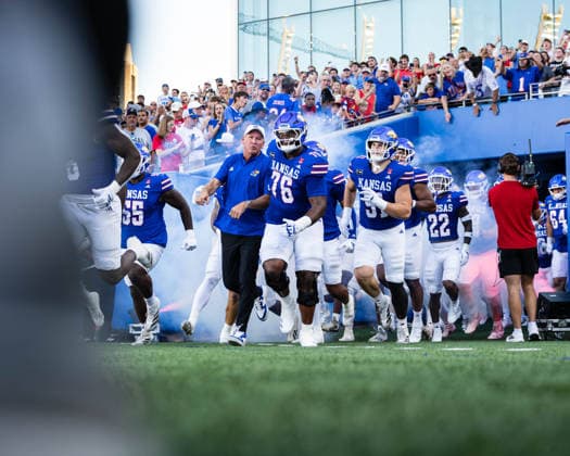 September 4, 2026, Lawrence, Kansas, USA: The Kansas Jayhawks football team runs out of the tunnel during introductions prior to the start of the football game against the Long Island Sharks at David Booth Kansas Memorial Stadium. Lawrence USA - ZUMAw173 20260904_zsp_w173_030 Copyright: xLukexWelshx
