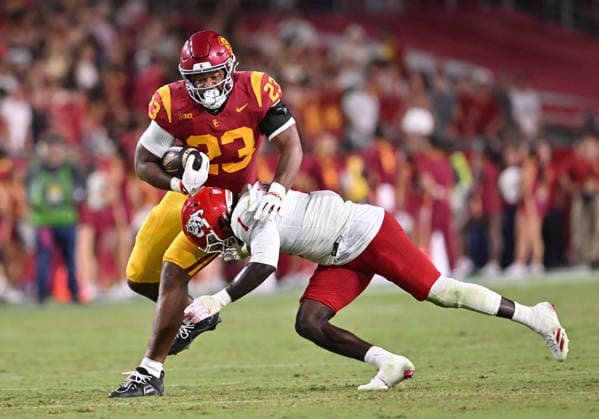 LOS ANGELES, CA - SEPTEMBER 04: Southern California Trojans tight end Walter Matthews (23) carries the ball for a gain of yards during the game between the USC Trojans and the Fresno State Bulldogs on September 04, 2026 at Los Angeles Memorial Coliseum in Los Angeles. (Photo by David Dennis Icon Sportswire) COLLEGE FOOTBALL: SEP 04 Fresno State at USC EDITORIAL USE ONLY Icon26090426
