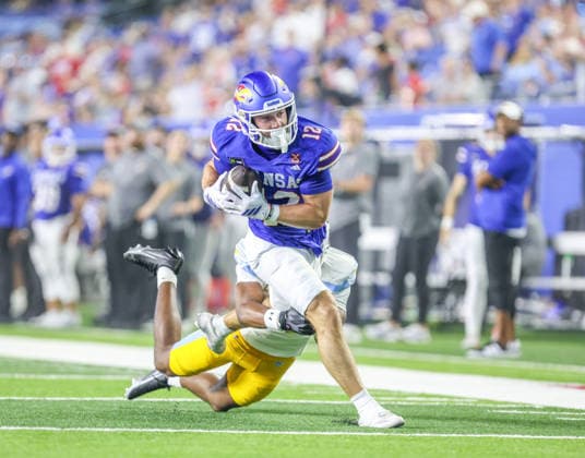 Sep 4, 2026: Kansas Jayhawks wide receiver Bryson Hayes (12) catches a pass against Long Island Sharks in Lawrence, KS, USA; at Memorial Stadium. Mandatory Credit: -Cal Media NCAA, College League, USA Football 2026: LIU Vs Kansas SEP 04  - ZUMAc04_ 20260904_zma_c04_086 Copyright: xRomanxPunox
