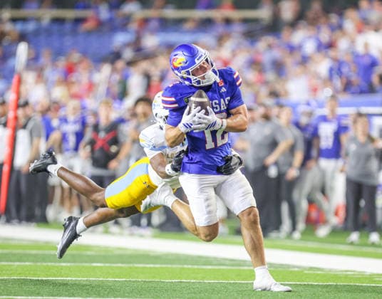 Sep 4, 2026: Kansas Jayhawks wide receiver Bryson Hayes (12) catches a pass against Long Island Sharks in Lawrence, KS, USA; at Memorial Stadium. Mandatory Credit: -Cal Media Lawrence USA - ZUMAc04_ 20260904_zma_c04_070 Copyright: xRomanxPunox