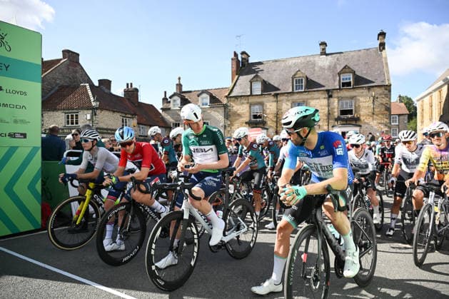 2026 Lloyds Tour of Britain Men Picture by Zac Williams SWpix.com - 05 09 2026 - Cycling - UCI ProSeries - 2026 Lloyds Tour of Britain Men - Stage 4: Helmsley to Leyburn (165.8km) - Lewis Askey (NSN Cycling Team) wearing the leaders jersey, Tim Merlier (Soudal Quick-Step) wearing the points jersey, Elliot Rowe (Great Britain national team, Nationalteam wearing the best young rider jersey, Michal Schuran (Team United Shipping) wearing the king of the mountains jersey, lining up in Helmsley Cycling Copyright: x xSWpix.comx(t axPhotographyxHubxLtd)xZacxWilliams SWpix.comx SWP-3030-22388